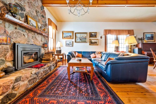 6000 Eighth Line, Erin, ON - Indoor Photo Showing Living Room With Fireplace