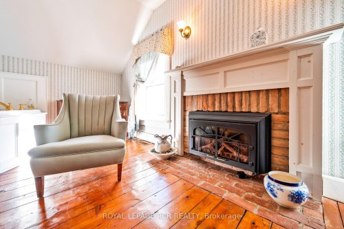 6000 Eighth Line, Erin, ON - Indoor Photo Showing Living Room With Fireplace