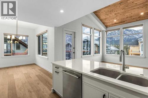 407, 1505 Spring Creek Gate, Canmore, AB - Indoor Photo Showing Kitchen With Double Sink