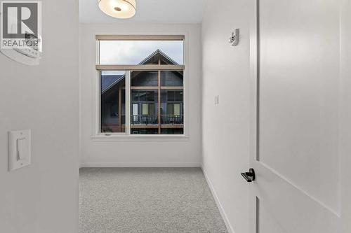 407, 1505 Spring Creek Gate, Canmore, AB - Indoor Photo Showing Other Room