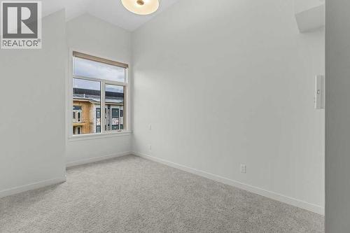 407, 1505 Spring Creek Gate, Canmore, AB - Indoor Photo Showing Other Room