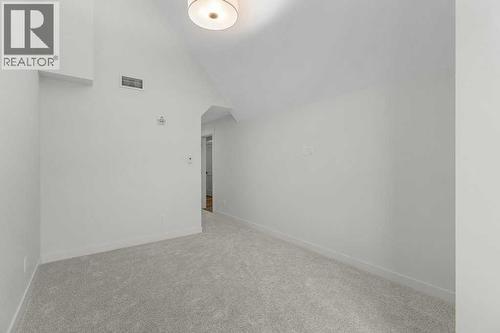 407, 1505 Spring Creek Gate, Canmore, AB - Indoor Photo Showing Other Room