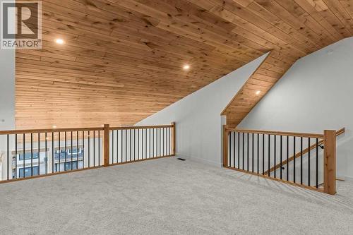 407, 1505 Spring Creek Gate, Canmore, AB - Indoor Photo Showing Other Room