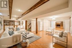 Virtually Staged basement- L-shaped rec area - 