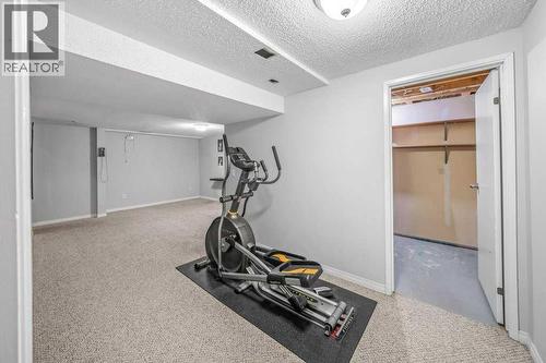 2140 146 Avenue Se, Calgary, AB - Indoor Photo Showing Gym Room