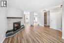 2140 146 Avenue Se, Calgary, AB  - Indoor Photo Showing Living Room With Fireplace 