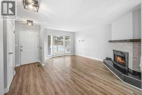 2140 146 Avenue Se, Calgary, AB - Indoor With Fireplace