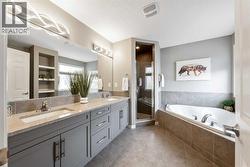 Full ENSUITE w/ Double Vanity, WALK-IN Shower & SOAKER TUB - 
