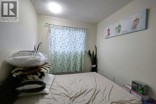 28 7 Avenue Se, High River, AB - Indoor Photo Showing Bedroom