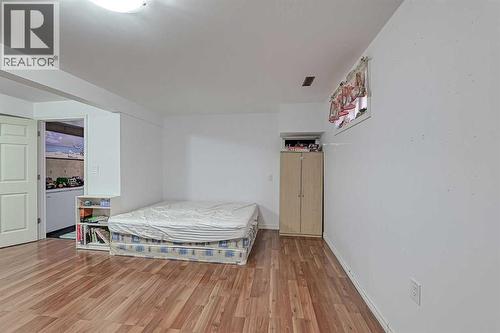28 7 Avenue Se, High River, AB - Indoor Photo Showing Bedroom