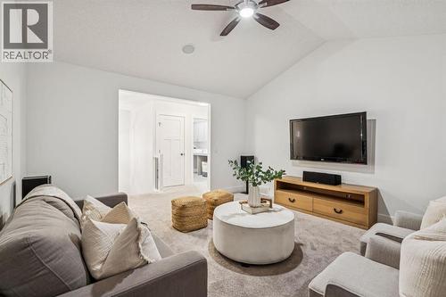 47 Sundown Way, Cochrane, AB - Indoor Photo Showing Living Room