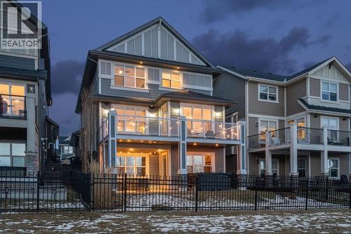 47 Sundown Way, Cochrane, AB - Outdoor With Facade