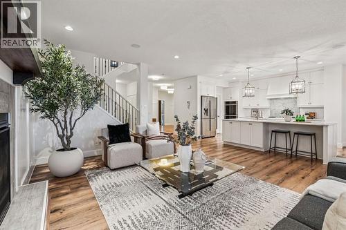 47 Sundown Way, Cochrane, AB - Indoor Photo Showing Living Room