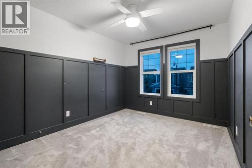 47 Sundown Way, Cochrane, AB - Indoor Photo Showing Other Room