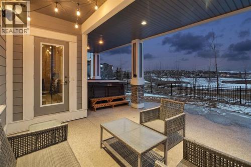 47 Sundown Way, Cochrane, AB - Outdoor With Facade