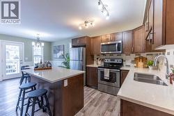 Door to west facing deck off dining area - 