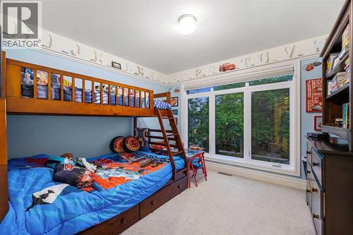 Buyers can pick new paint colours for 2nd level kids' bedrooms if preferred! - 922 5 Street Nw, Calgary, AB - Indoor Photo Showing Bedroom