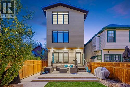 Professionally irrigated front and back yards - 922 5 Street Nw, Calgary, AB - Outdoor With Deck Patio Veranda