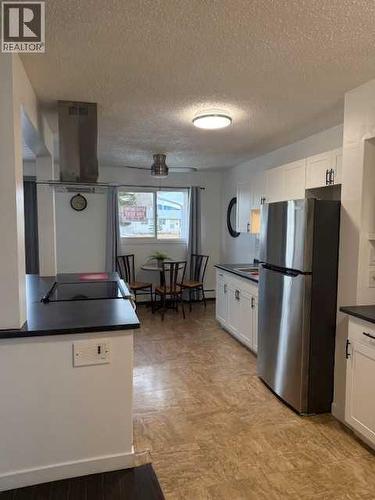 202, 11114 Hoppe, Grande Cache, AB - Indoor Photo Showing Kitchen