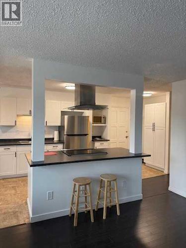 202, 11114 Hoppe, Grande Cache, AB - Indoor Photo Showing Kitchen