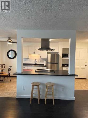 202, 11114 Hoppe, Grande Cache, AB - Indoor Photo Showing Kitchen