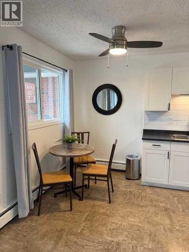 202, 11114 Hoppe, Grande Cache, AB - Indoor Photo Showing Dining Room