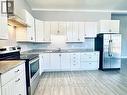 Kitchen (10ft ceilings) - Unit A - 528 Lincoln Street, Welland, ON  - Indoor Photo Showing Kitchen With Double Sink 