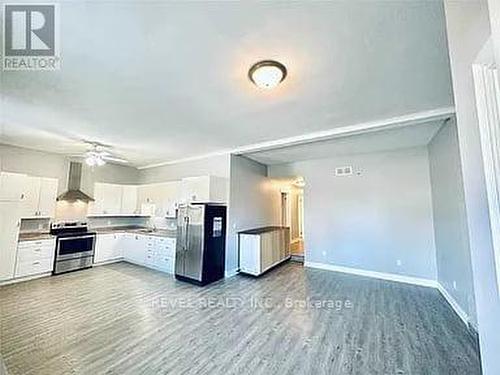 Living Room & large eat in kitchen (10ft ceilings) - Unit A - 528 Lincoln Street, Welland, ON - Indoor Photo Showing Kitchen