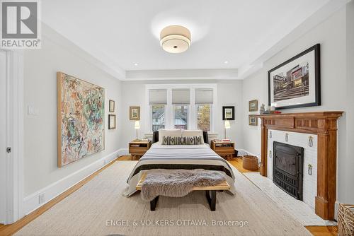 297 Clemow Avenue, Ottawa, ON - Indoor Photo Showing Bedroom With Fireplace