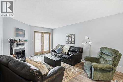 164 Cedar Meadow Drive, Regina, SK - Indoor Photo Showing Living Room With Fireplace