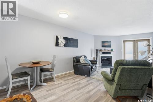 164 Cedar Meadow Drive, Regina, SK - Indoor Photo Showing Living Room With Fireplace