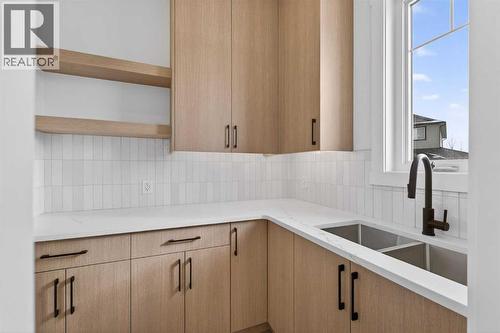 32 Lakes Estates Circle, Strathmore, AB - Indoor Photo Showing Kitchen With Double Sink