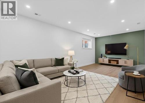 Virtually Staged - 32 Lakes Estates Circle, Strathmore, AB - Indoor Photo Showing Living Room