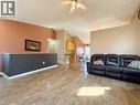 2905 10 Avenue, Wainwright, AB  - Indoor Photo Showing Living Room With Fireplace 