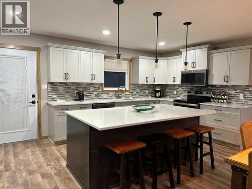 67 Ironstone Drive, Coleman, AB - Indoor Photo Showing Kitchen With Upgraded Kitchen