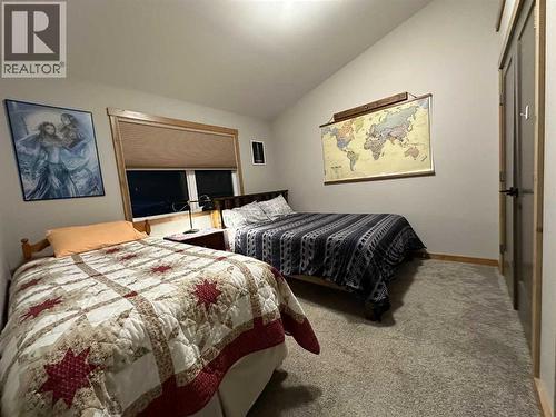 67 Ironstone Drive, Coleman, AB - Indoor Photo Showing Bedroom