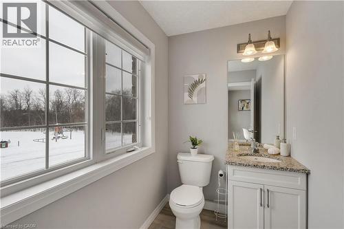 Bathroom featuring vanity and light wood-style flooring - 492 Wismer Street, Waterloo, ON - Indoor Photo Showing Bathroom