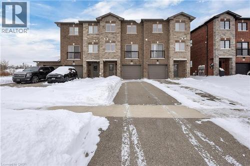 View of front of house with brick siding - 492 Wismer Street, Waterloo, ON - Outdoor With Facade