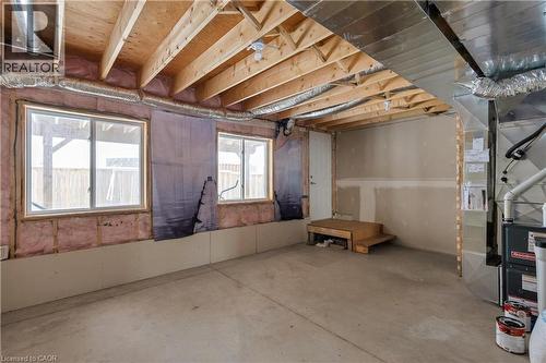 Basement with heating unit - 492 Wismer Street, Waterloo, ON - Indoor Photo Showing Basement
