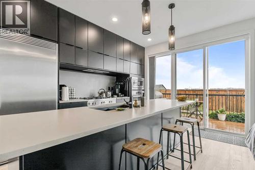 668 Aquitania Boulevard W, Lethbridge, AB - Indoor Photo Showing Kitchen With Upgraded Kitchen