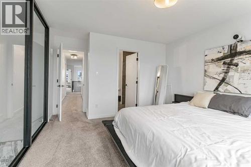 668 Aquitania Boulevard W, Lethbridge, AB - Indoor Photo Showing Bedroom