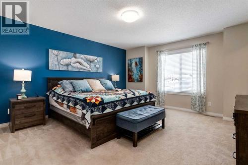 26 Mount Rae Terrace, Okotoks, AB - Indoor Photo Showing Bedroom