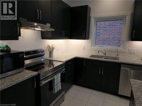 293 Chokecherry Crescent, Waterloo, ON - Indoor Photo Showing Kitchen With Stainless Steel Kitchen With Double Sink With Upgraded Kitchen