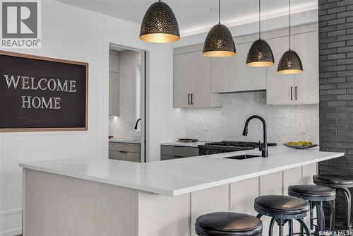 428 Woolf Bend, Saskatoon, SK - Indoor Photo Showing Kitchen With Upgraded Kitchen