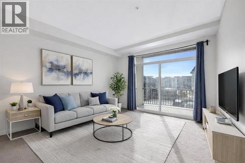 211, 10 Walgrove Walk Se, Calgary, AB - Indoor Photo Showing Living Room