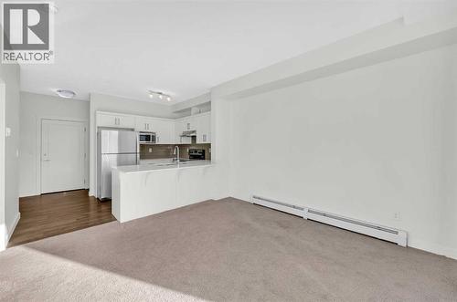 211, 10 Walgrove Walk Se, Calgary, AB - Indoor Photo Showing Kitchen