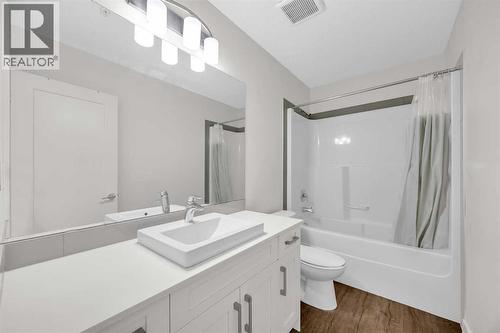 211, 10 Walgrove Walk Se, Calgary, AB - Indoor Photo Showing Bathroom