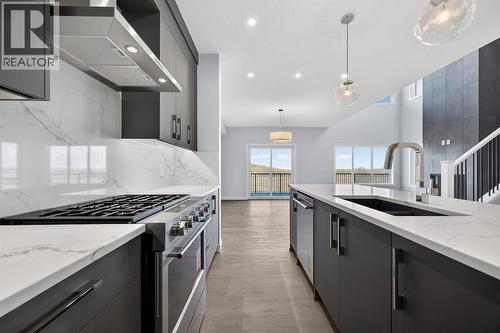93 Walgrove Bay Se, Calgary, AB - Indoor Photo Showing Kitchen With Double Sink With Upgraded Kitchen