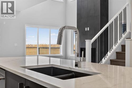 93 Walgrove Bay Se, Calgary, AB - Indoor Photo Showing Kitchen With Double Sink