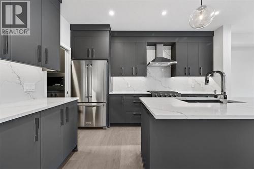 93 Walgrove Bay Se, Calgary, AB - Indoor Photo Showing Kitchen With Stainless Steel Kitchen With Upgraded Kitchen